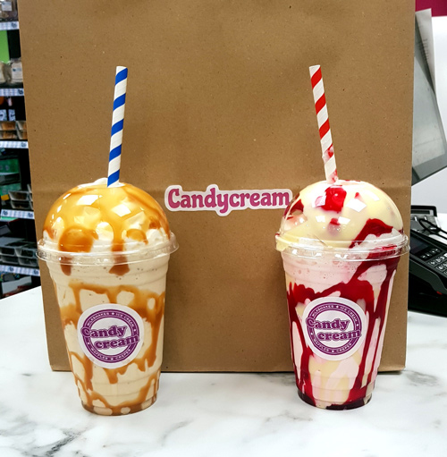 Two gourmet milkshakes topped with whipped cream, served at the Candy Cream 
dessert shop in Bathgate