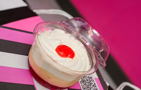 Creamy soft-serve ice cream served in a plastic tube from Candy Cream dessert 
shop in Bathgate 